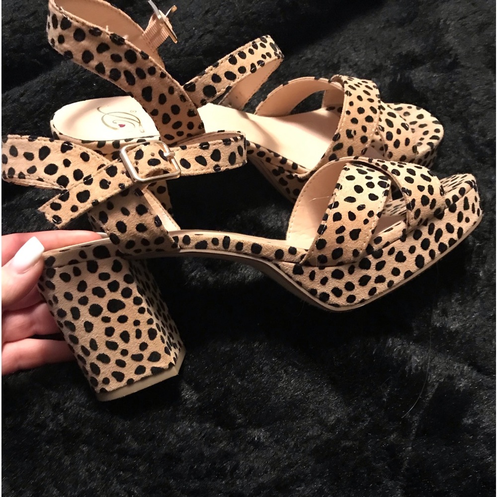 No name brand. Leopard wedges size 9 worn a few times. Face side is clean.